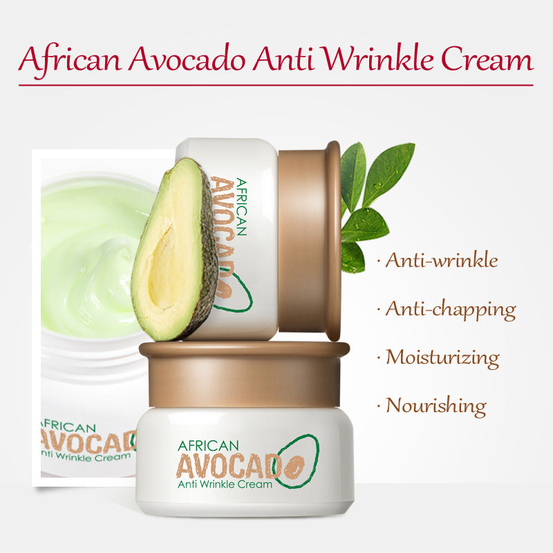 African Avocado Anti Wrinkle Cream with avocado half and green leaves on a white background
