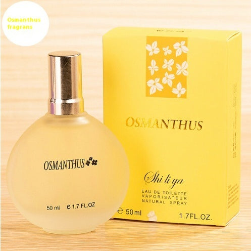 Osmanthus perfume bottle and packaging on a beige background