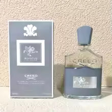 Credo perfume bottle with packaging on a textured beige background