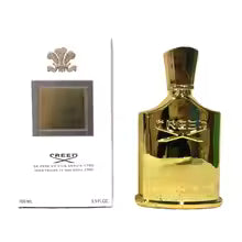 Gold Creed perfume bottle with packaging on a white background