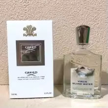 Creed bottle and packaging on a white background